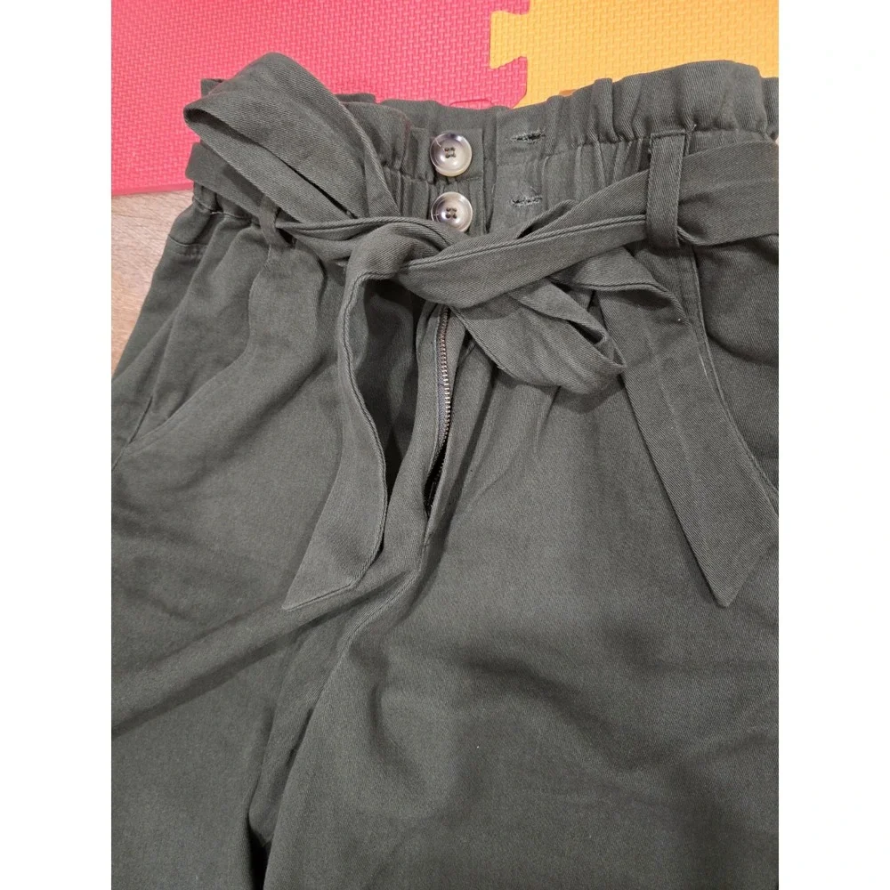 Rebels & Lovers casual pants featuring a flattering paperbag high-rise waist....